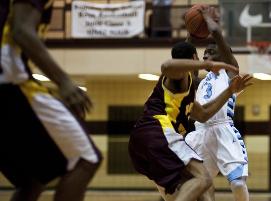 Skyline High School senior Travonn Banks looks to pass in the first half of the game against Windsor Catholic Central on Saturday. Daniel Brenner I AnnArbor.com